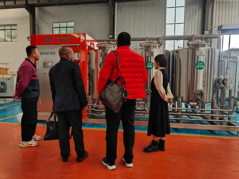 INTOP zet met succes een productielijn voor gezuiverde waterdranken op in Tanzania